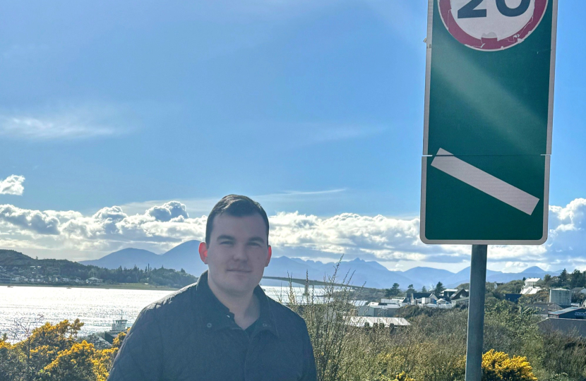 Councillor Stewart with 20mph road sign.